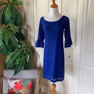Royal blue dress by CHRIS McLaughlin, size 4. Lace overlay. Lined. 3-4 sleeve.